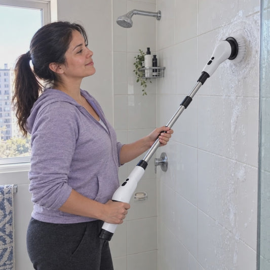 Limpiando la ducha con el cepillo eléctrico giratorio